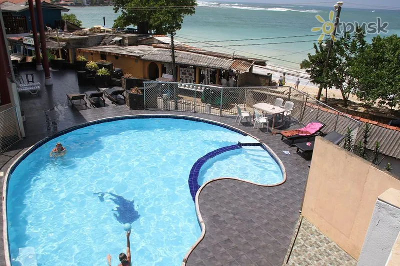 Фото отеля Neptune Bay Hotel 3* Unawatuna Šri Lanka išorė ir baseinai