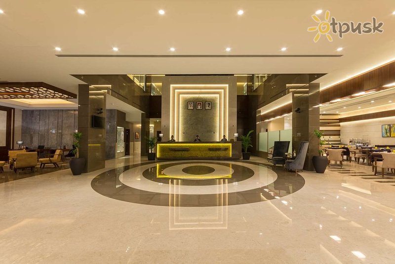 Фото отеля Golden Tulip Media Hotel 4* Дубай ОАЭ лобби и интерьер
