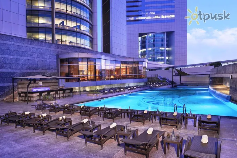 Фото отеля Jumeirah Emirates Towers 5* Dubajus JAE išorė ir baseinai