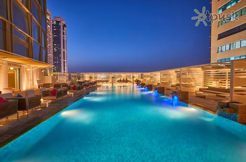 Фото отеля Media One Hotel 4* Дубай ОАЭ экстерьер и бассейны
