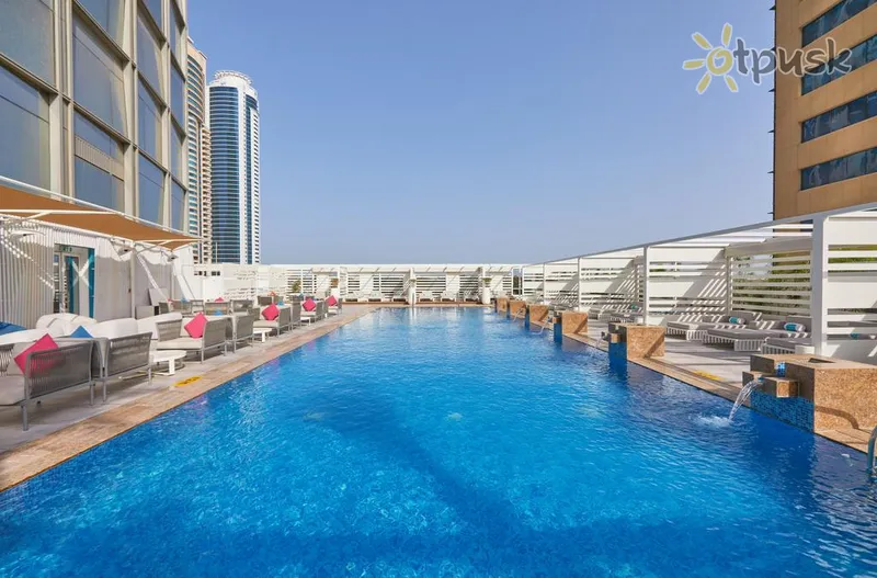 Фото отеля Media One Hotel 4* Дубай ОАЭ экстерьер и бассейны