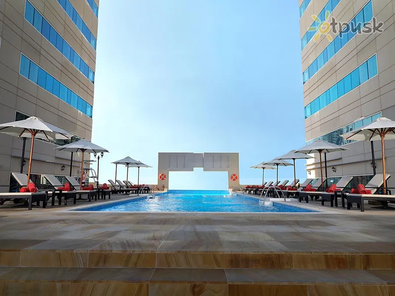 Фото отеля Media Rotana 5* Дубай ОАЕ екстер'єр та басейни