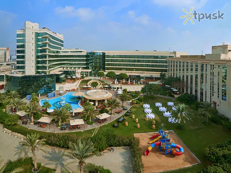 Фото отеля Millennium Airport Hotel Dubai 4* Дубай ОАЭ экстерьер и бассейны