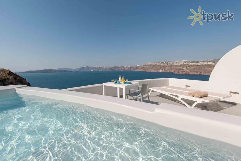 Фото отеля Neptune Luxury Spa Suites 5* par. Santorini Grieķija ārpuse un baseini