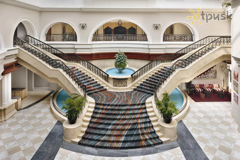 Фото отеля Mövenpick Hotel & Apartments Bur Dubai 5* Дубай ОАЭ лобби и интерьер