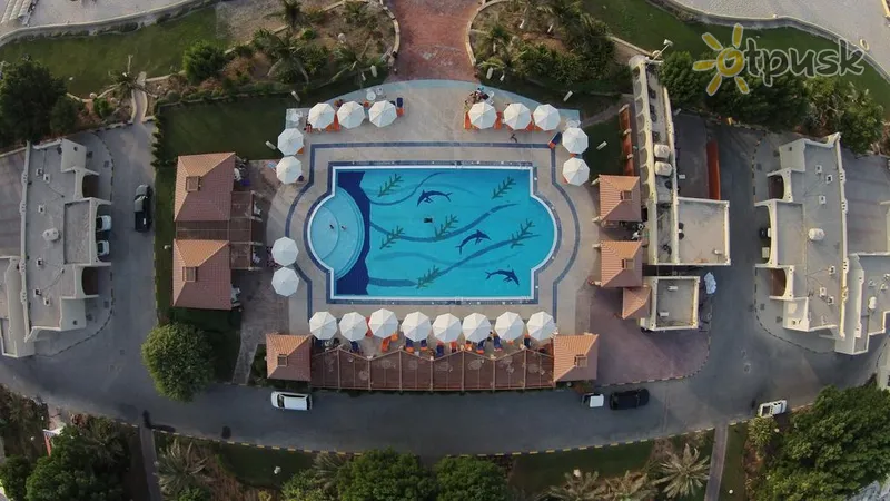 Фото отеля Umm Al Quwain Beach Hotel 4* Умм Аль-Кувейн ОАЕ екстер'єр та басейни