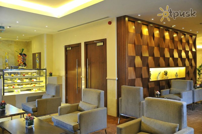 Фото отеля Ramada Abu Dhabi Corniche 4* Абу Даби ОАЭ бары и рестораны
