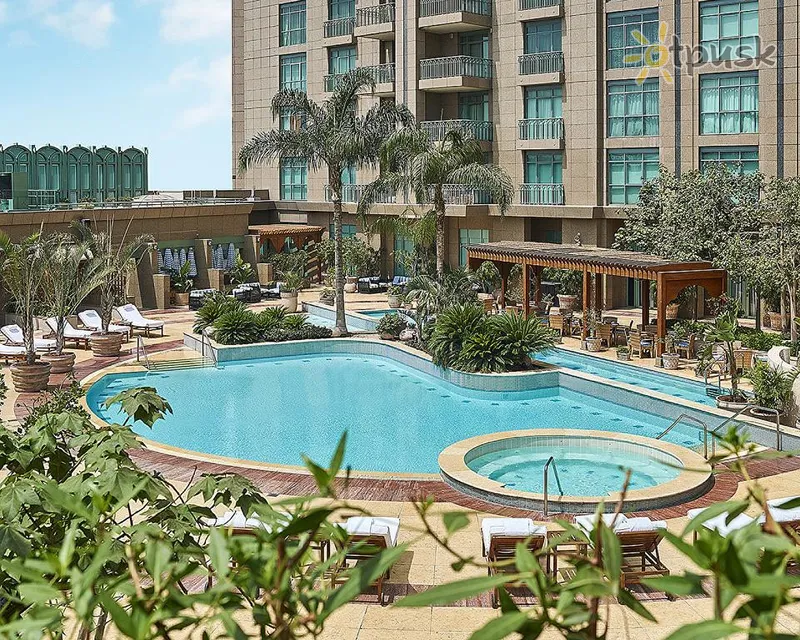 Фото отеля Four Seasons Hotel Cairo at Nile Plaza 5* Каир Египет экстерьер и бассейны