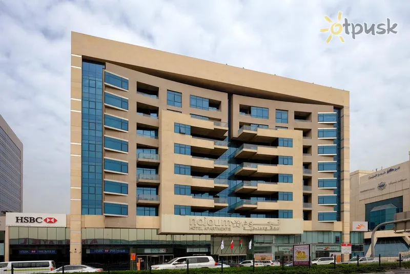 Фото отеля Nojoum Hotel Apartments 3* Дубай ОАЭ экстерьер и бассейны