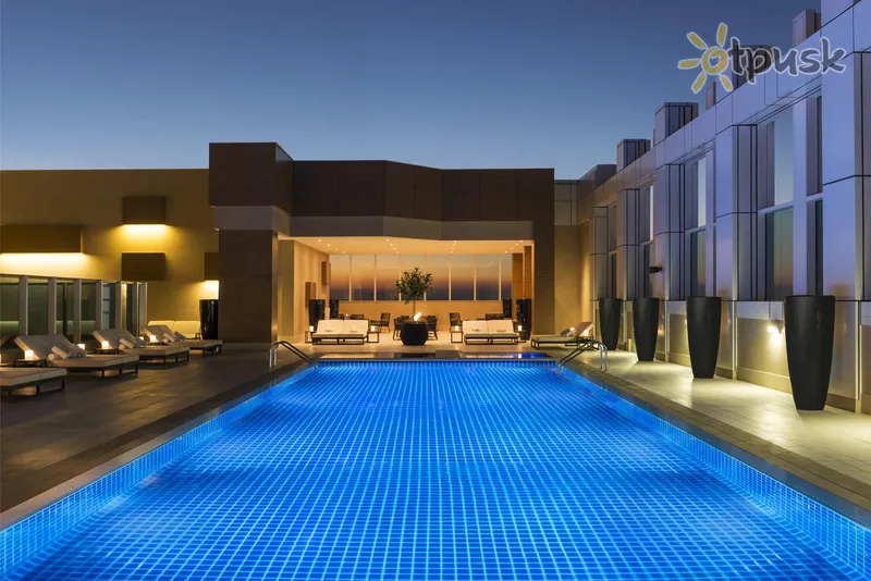 Фото отеля Sheraton Grand Hotel 5* Дубай ОАЭ экстерьер и бассейны