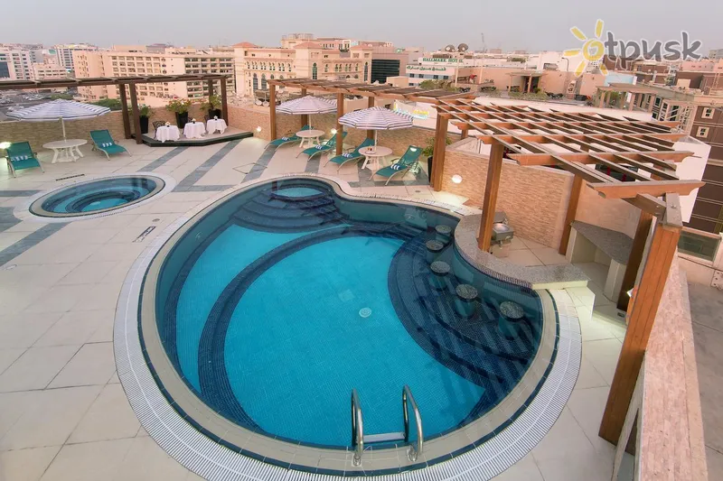 Фото отеля Lotus Grand Hotel 4* Дубай ОАЭ экстерьер и бассейны