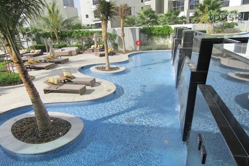 Фото отеля Taj Dubai 5* Дубай ОАЭ экстерьер и бассейны