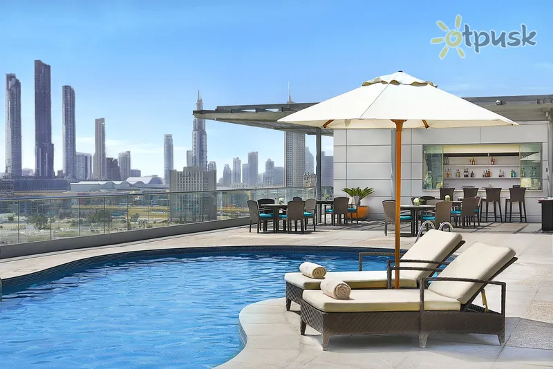 Фото отеля The Ritz-Carlton Dubai International Financial Centre 5* Дубай ОАЭ экстерьер и бассейны