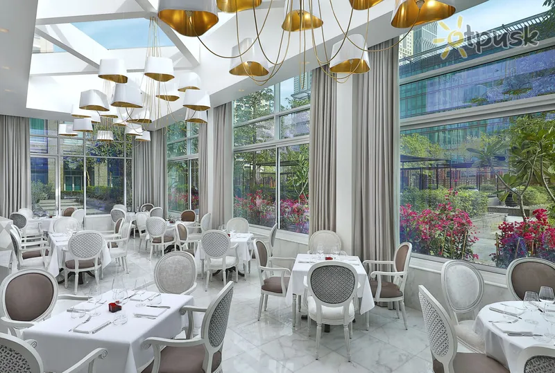 Фото отеля The Ritz-Carlton Dubai International Financial Centre 5* Дубай ОАЭ бары и рестораны