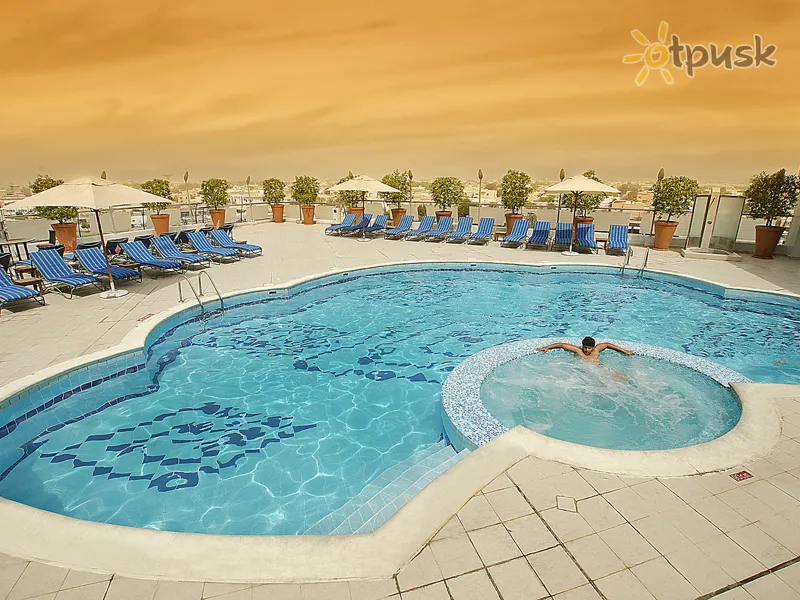 Фото отеля Towers Rotana Hotel 4* Дубай ОАЭ экстерьер и бассейны