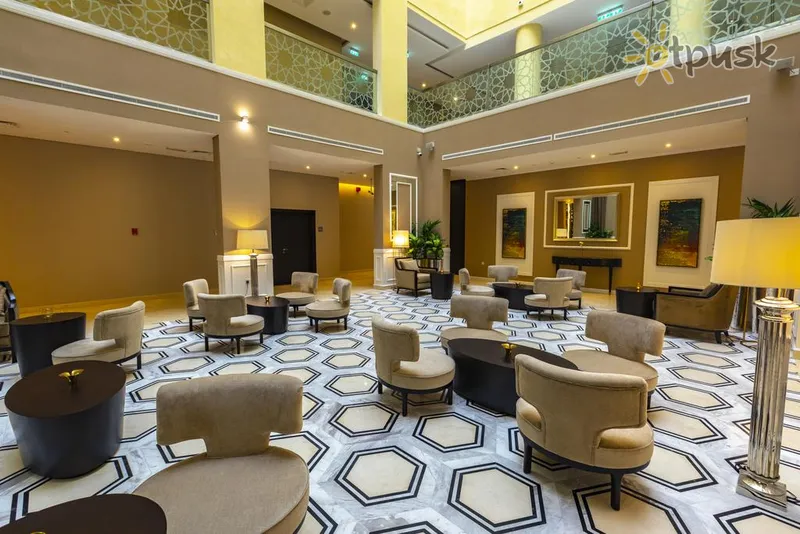 Фото отеля Occidental Dubai Production City 4* Дубай ОАЕ лобі та інтер'єр