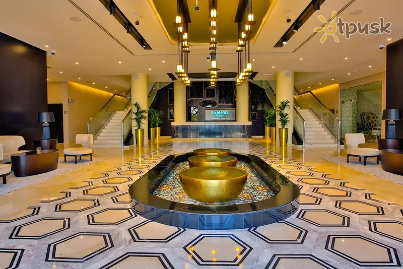 Фото отеля Occidental Dubai Production City 4* Дубай ОАЭ лобби и интерьер
