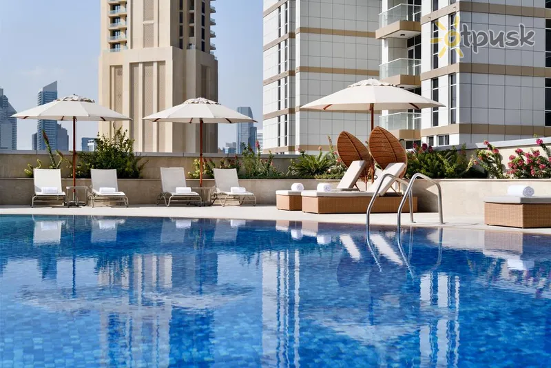 Фото отеля Movenpick Hotel Apartments Downtown Dubai 5* Дубай ОАЭ экстерьер и бассейны