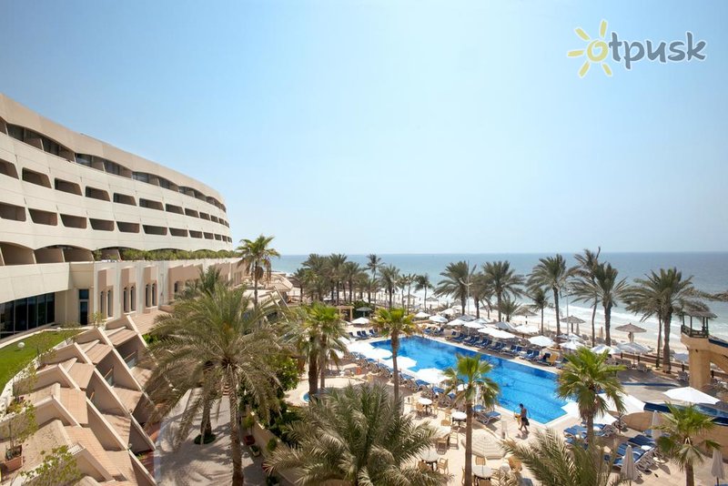 Фото отеля Occidental Sharjah Grand 4* Шарджа ОАЭ экстерьер и бассейны