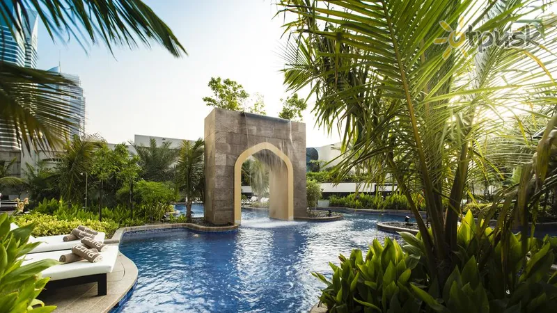 Фото отеля Conrad Dubai 5* Дубай ОАЭ экстерьер и бассейны