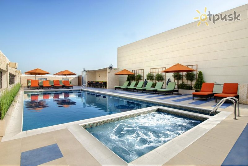 Фото отеля Cosmopolitan Hotel 4* Дубай ОАЭ экстерьер и бассейны