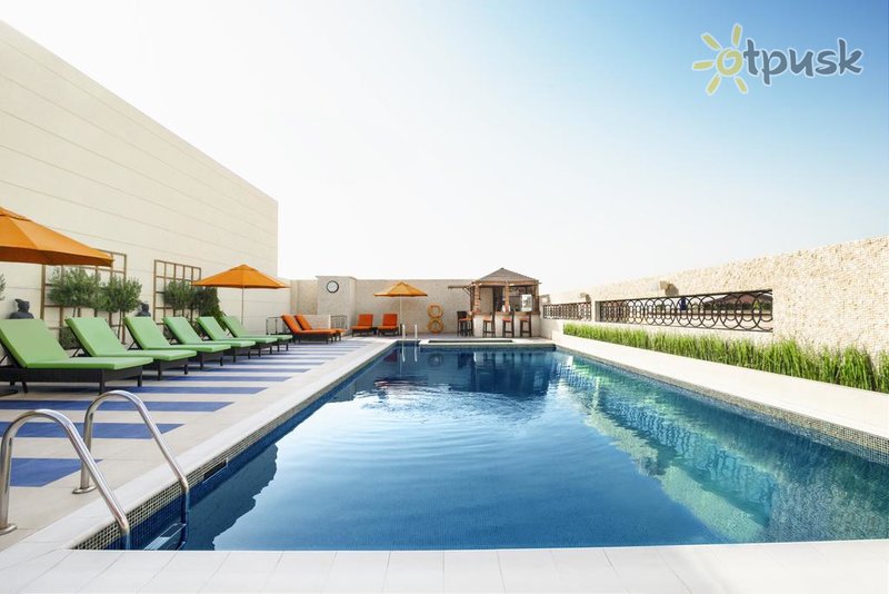 Фото отеля Cosmopolitan Hotel 4* Дубай ОАЭ экстерьер и бассейны