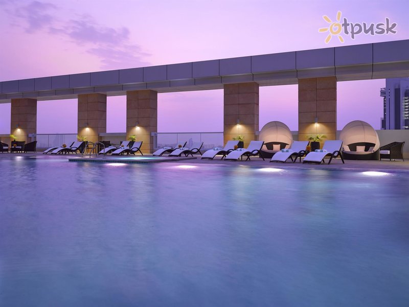 Фото отеля Dusit Thani Abu Dhabi 5* Абу Даби ОАЭ экстерьер и бассейны