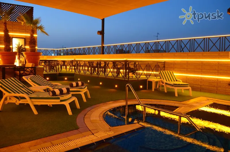 Фото отеля Golden Tulip Deira Hotel 4* Дубай ОАЭ экстерьер и бассейны