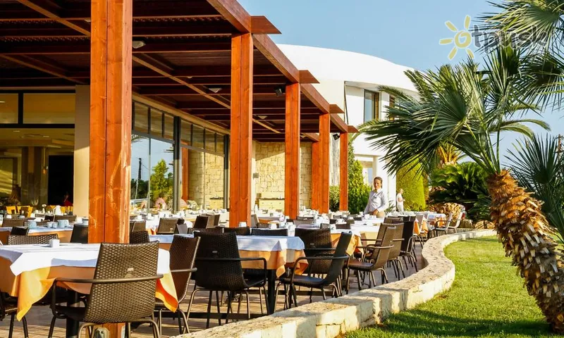 Фото отеля Grand Hotel Holiday Resort 4* о. Крит – Іракліон Греція бари та ресторани
