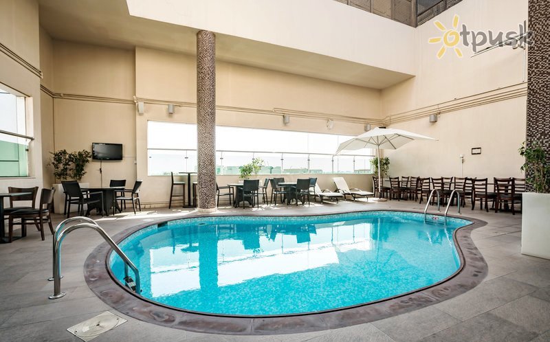 Фото отеля Ramada Downtown Abu Dhabi 4* Абу Даби ОАЭ экстерьер и бассейны