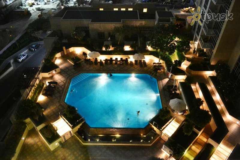Фото отеля Ramada Downtown Burj Dubai 4* Дубай ОАЭ экстерьер и бассейны