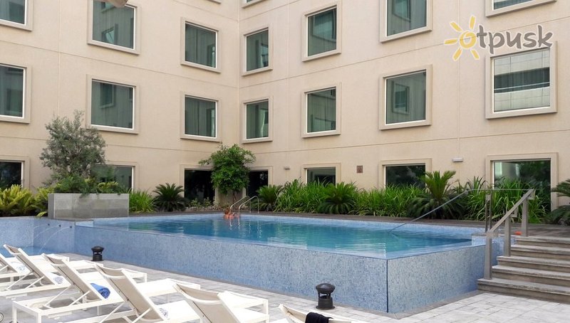 Фото отеля Hilton Garden Inn Dubai Mall Of The Emirates 4* Дубай ОАЭ экстерьер и бассейны