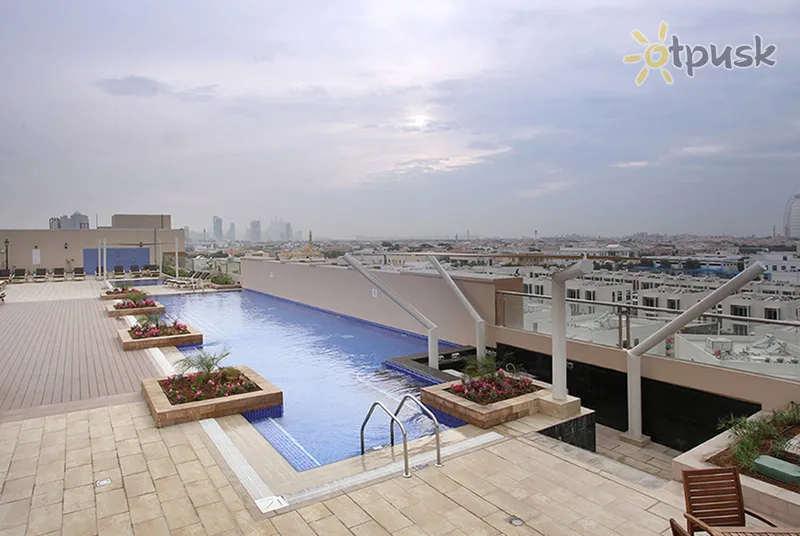Фото отеля Metropolitan Hotel Dubai 4* Дубай ОАЭ экстерьер и бассейны