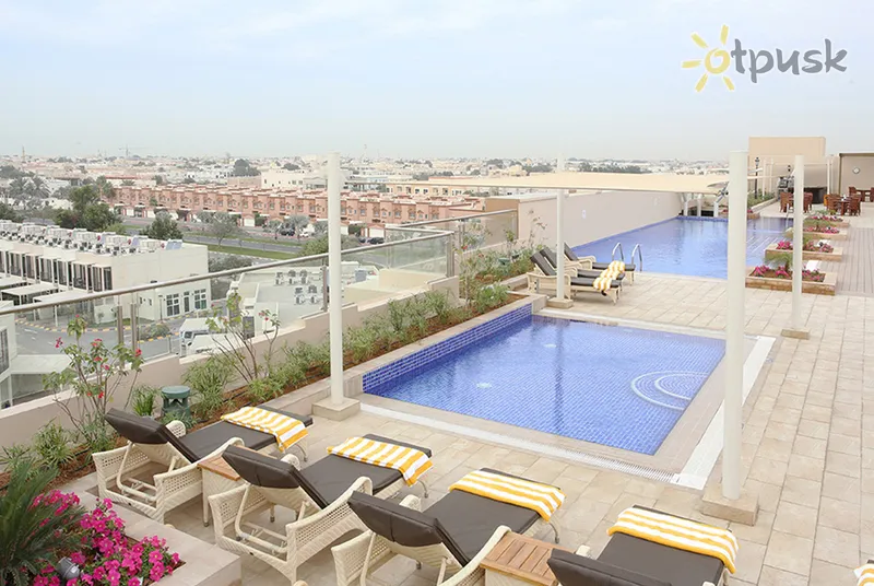 Фото отеля Metropolitan Hotel Dubai 4* Дубай ОАЭ экстерьер и бассейны