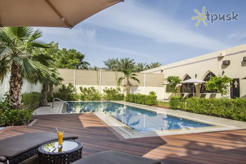 Фото отеля Millennium Central Mafraq 4* Абу Дабі ОАЕ екстер'єр та басейни