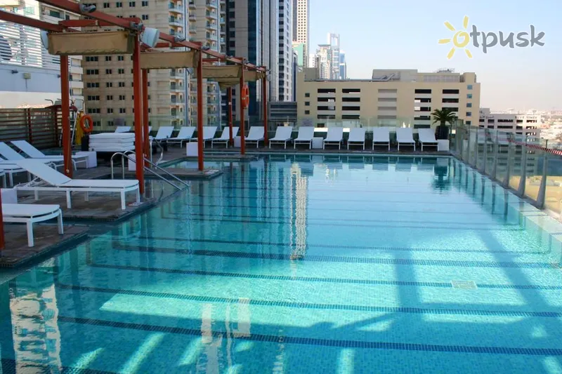 Фото отеля Voco Dubai 5* Дубай ОАЭ экстерьер и бассейны