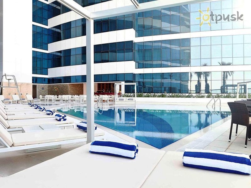 Фото отеля Novotel Dubai Al Barsha 4* Дубай ОАЭ экстерьер и бассейны