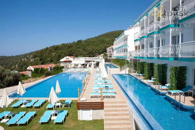 Фото отеля Ramada by Wyndham Fethiye Oludeniz 4* Фетхіє Туреччина екстер'єр та басейни