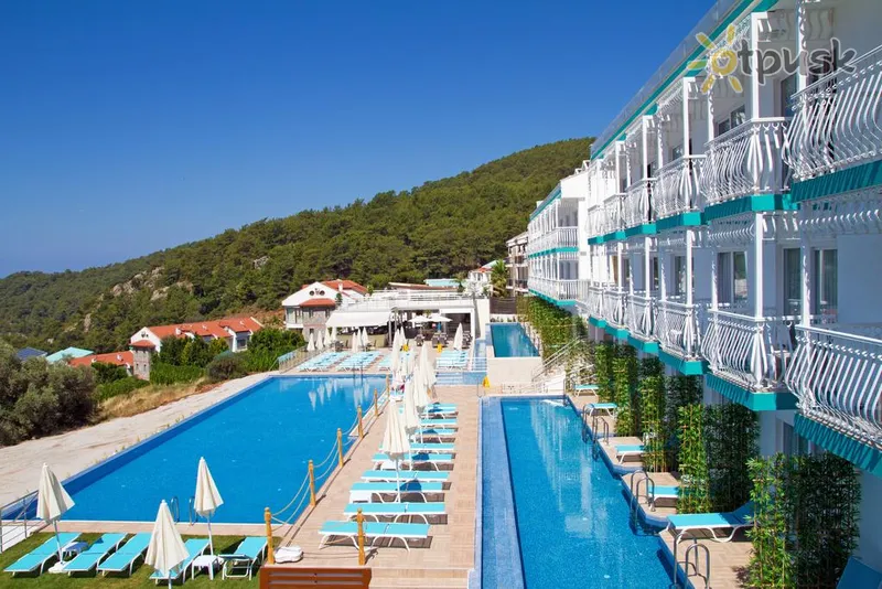 Фото отеля Sertil Deluxe Hotel 4* Фетхие Турция экстерьер и бассейны