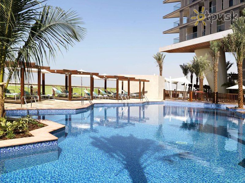 Фото отеля Radisson Blu Hotel Yas Island 4* Абу Даби ОАЭ экстерьер и бассейны