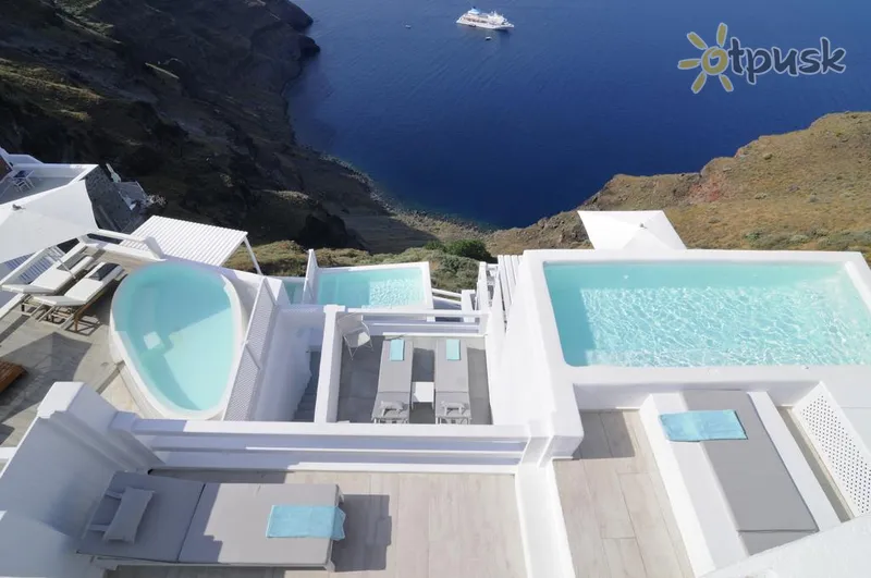 Фото отеля Aqua Luxury Suites 5* par. Santorini Grieķija ārpuse un baseini