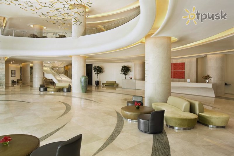 Фото отеля Millennium Al Rawdah Hotel 5* Абу Даби ОАЭ лобби и интерьер