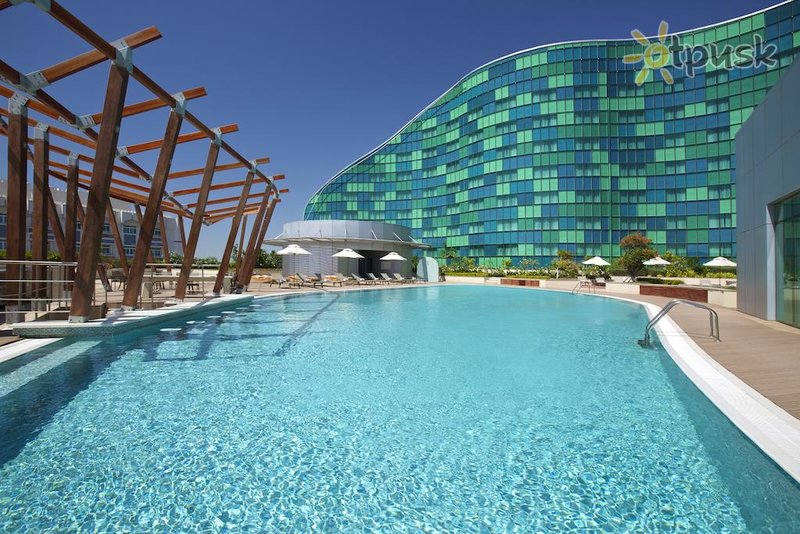 Фото отеля Millennium Al Rawdah Hotel 5* Абу Даби ОАЭ экстерьер и бассейны