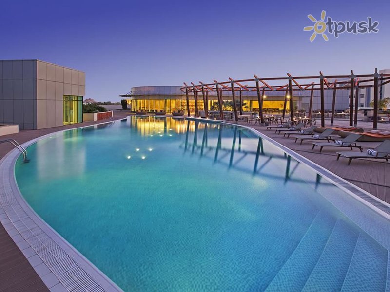 Фото отеля Millennium Al Rawdah Hotel 5* Абу Даби ОАЭ экстерьер и бассейны
