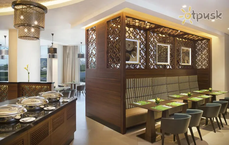 Фото отеля Hilton Garden Inn Dubai Al Mina 4* Дубай ОАЕ бари та ресторани