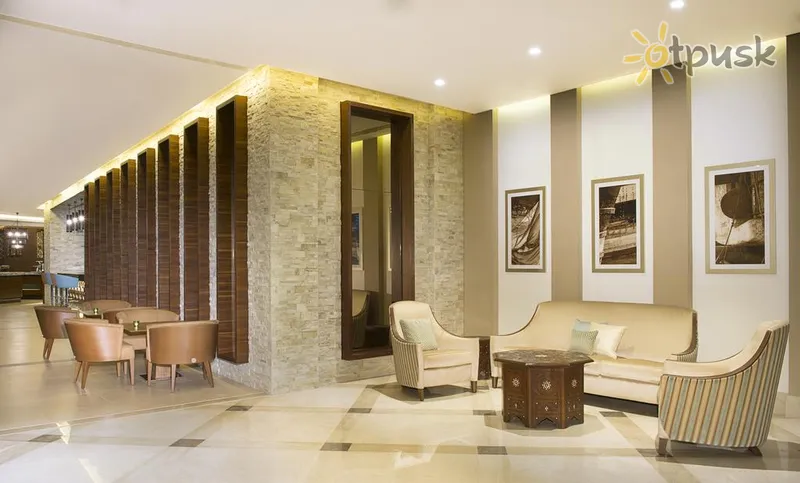 Фото отеля Hilton Garden Inn Dubai Al Mina 4* Дубай ОАЭ лобби и интерьер