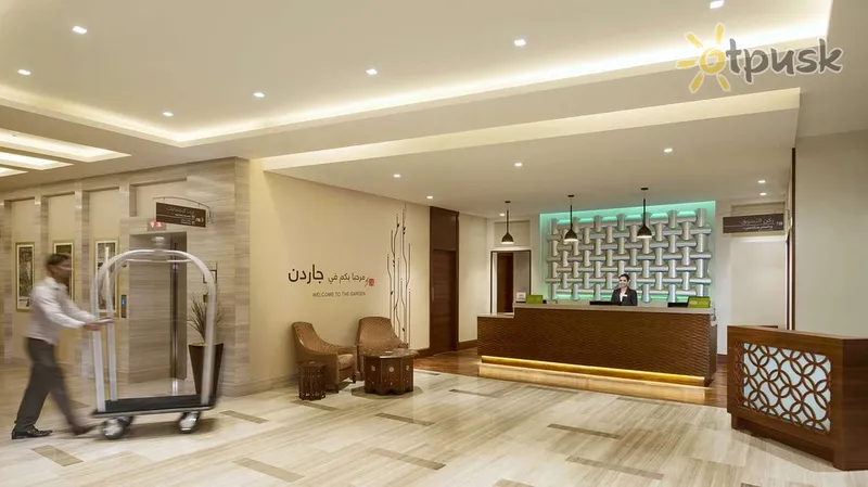 Фото отеля Hilton Garden Inn Dubai Al Muraqabat 4* Дубай ОАЭ лобби и интерьер