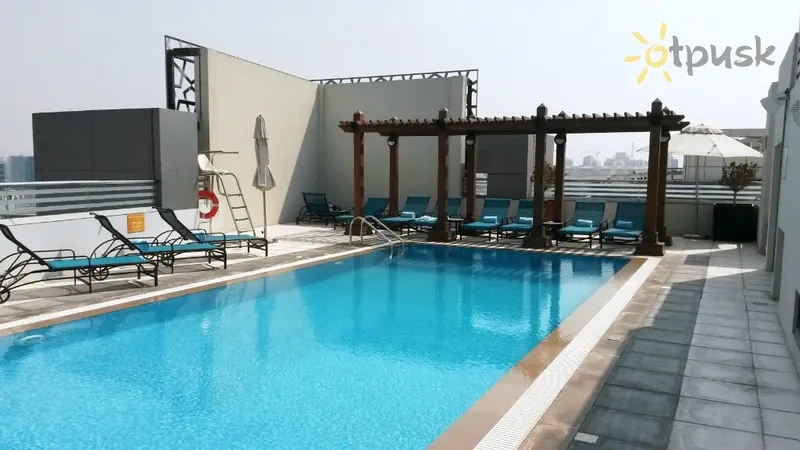 Фото отеля Hilton Garden Inn Dubai Al Muraqabat 4* Дубай ОАЕ екстер'єр та басейни