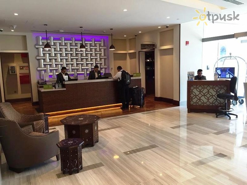 Фото отеля Hilton Garden Inn Dubai Al Muraqabat 4* Дубай ОАЭ лобби и интерьер