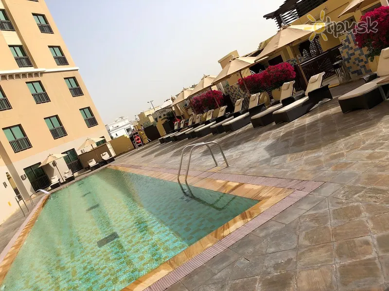 Фото отеля Traders Hotel Qaryat Al Beri Abu Dhabi 4* Abu dabī AAE ārpuse un baseini